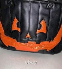 JOL FACE HANDBAG. Large. Black with Orange Accents. Used but Excellent Condition