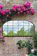 The Arcus New Extra Large Black Framed Garden Window Mirror 69x33 174 X 85cm