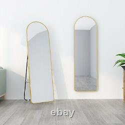 Miroir plein pied MIQU avec cadre noir et or, de grand format et monté sur pied ou fixé au mur
