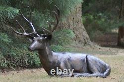 Ornement de jardin Cerf couché, finition noire et bronze. En fonte d'aluminium